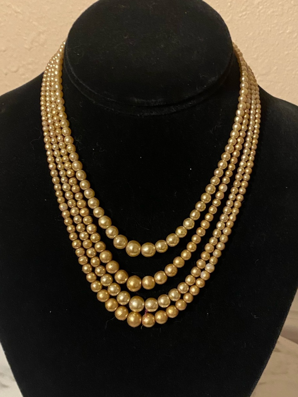 Vintage gold tone, 4 strand "pearls"